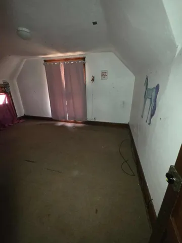 a bathroom with a light and a light fixture