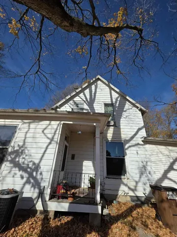 a view of living room with wooden floor