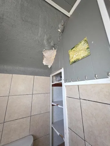 a living room with television