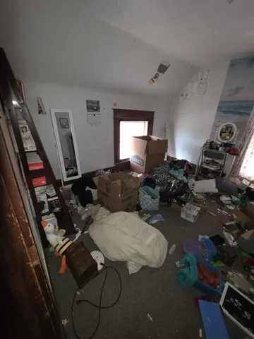 a room with gym equipment and toys