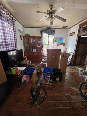 a room with gym equipment and a window