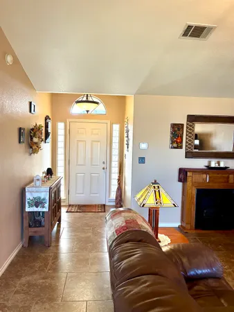 a view of a bedroom with furniture and staircase