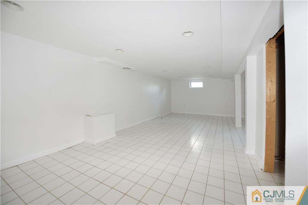 214 3rd Street Middlesex, NJ 08846 - Photo 15 of 22 a view of an empty room and window
