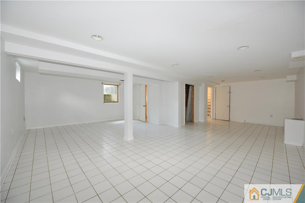 214 3rd Street Middlesex, NJ 08846 - Photo 16 of 22 a view of an empty room and window