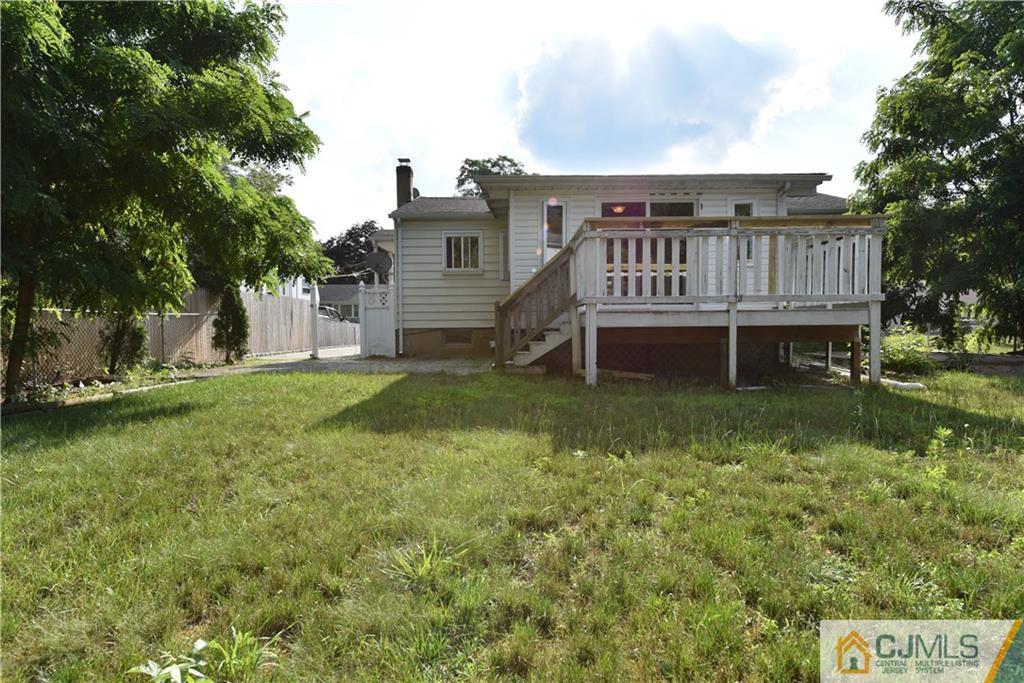 214 3rd Street Middlesex, NJ 08846 - Photo 21 of 22 a view of a house with a yard