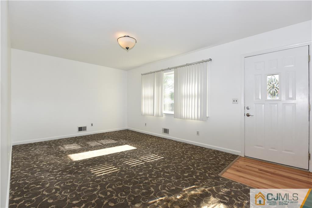 214 3rd Street Middlesex, NJ 08846 - Photo 4 of 22 a view of a room with window