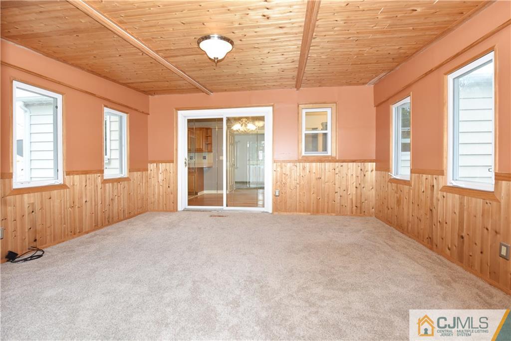 214 3rd Street Middlesex, NJ 08846 - Photo 10 of 22 an empty room with windows