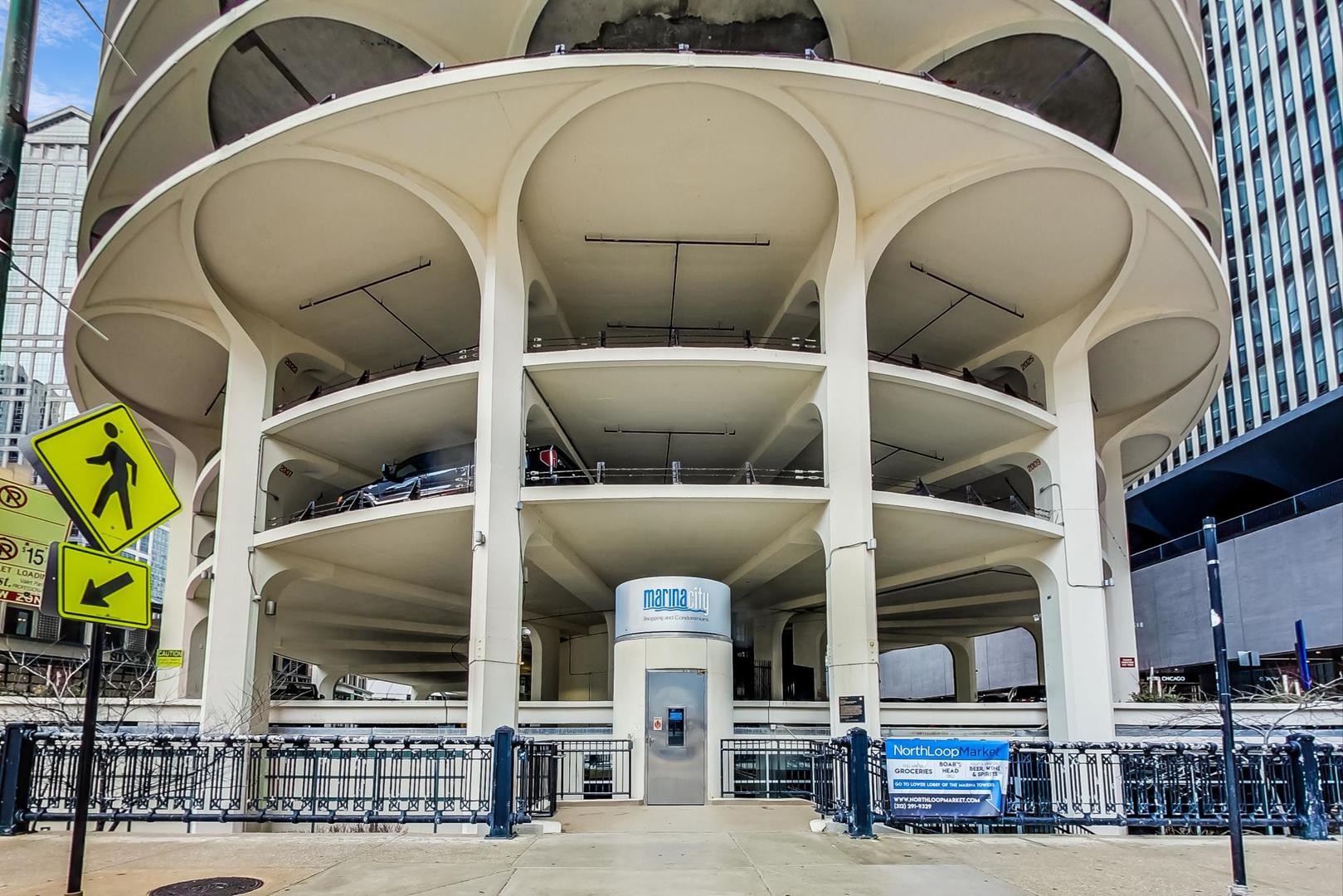 300 North State Street, Unit 4308 Chicago, IL 60654 - Photo 28 of 32 a front view of a building with glass windows