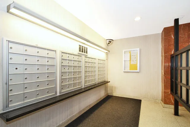 a view of a big room with windows