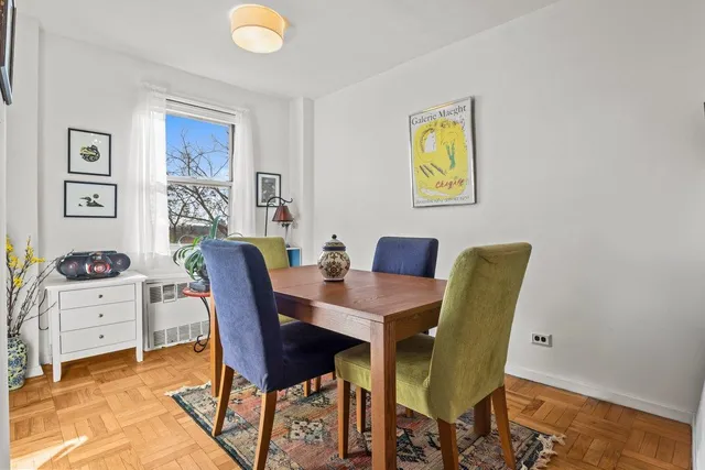 a kitchen with stainless steel appliances granite countertop a refrigerator and a stove