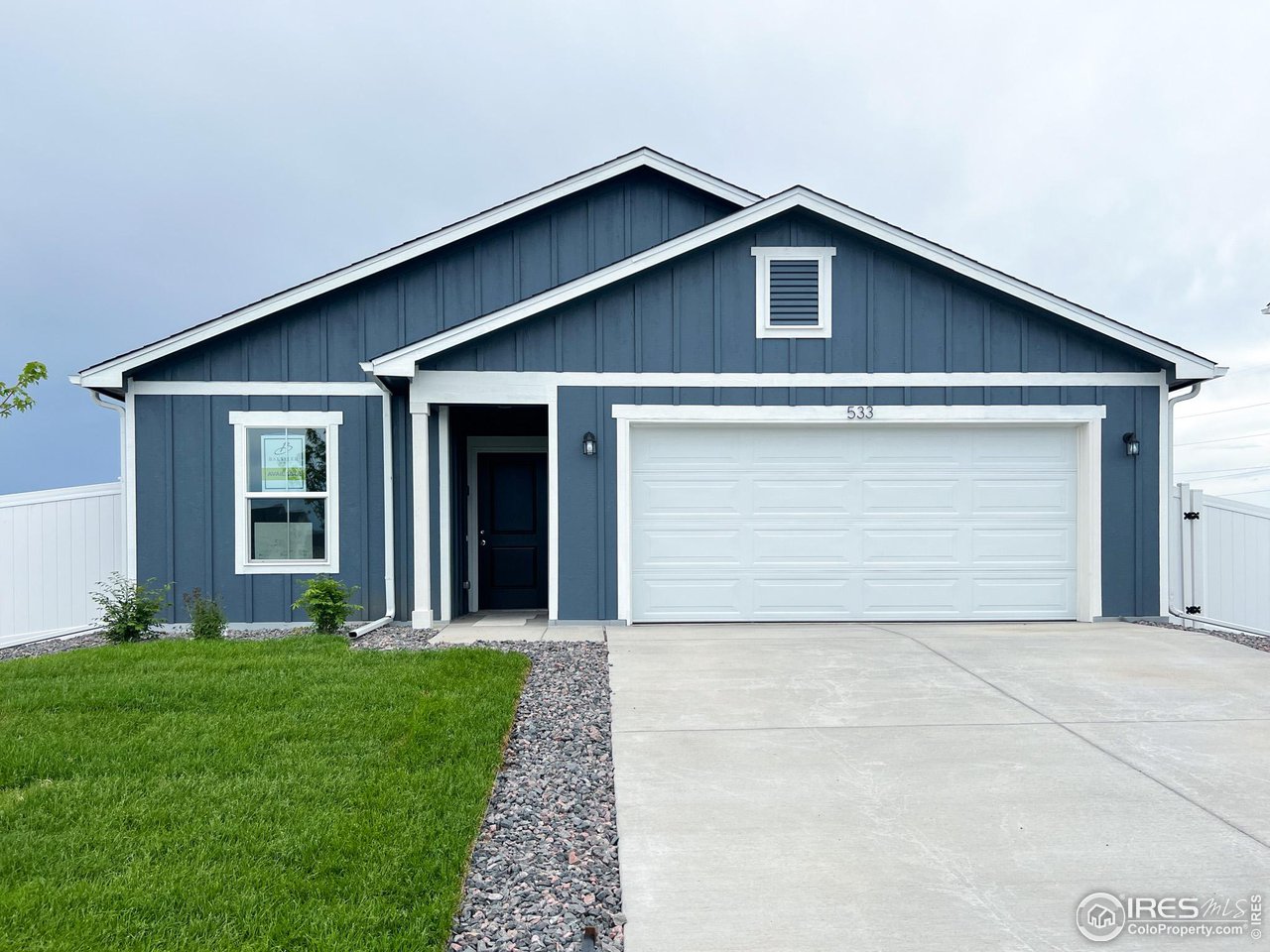 533 Bridger Avenue Fort Lupton, CO 80621 - Photo 1 of 9 a front view of house with yard and green space