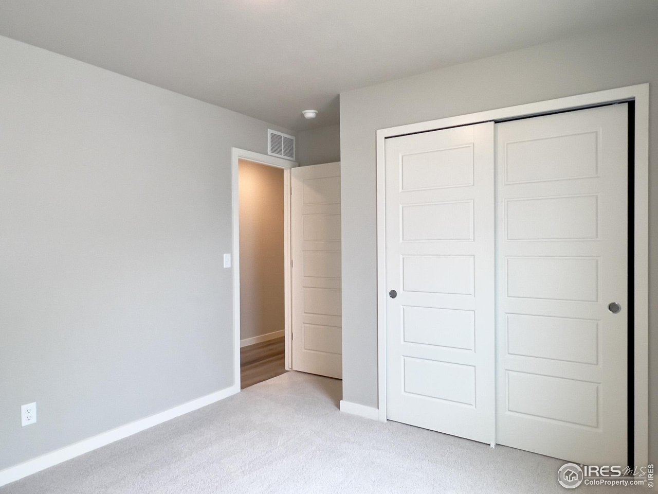 533 Bridger Avenue Fort Lupton, CO 80621 - Photo 7 of 9 an empty room with closet area