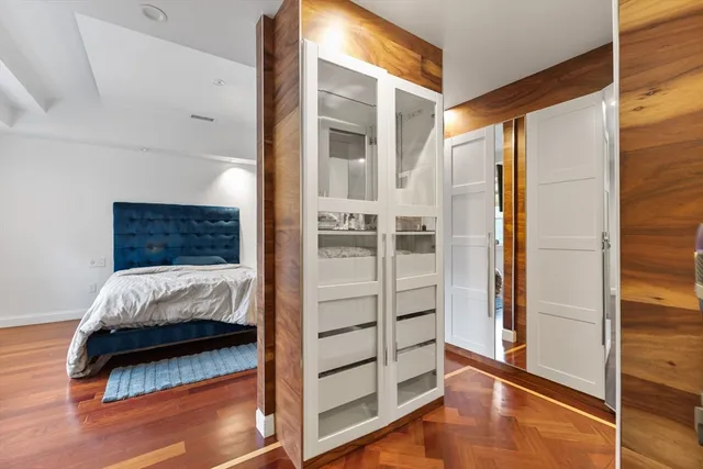 a bathroom with a sink a toilet and a window