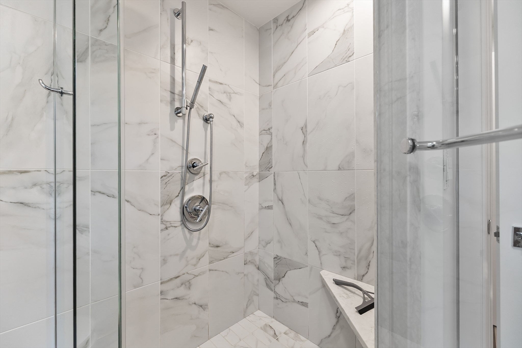 4 Hadley Road Lexington, MA 02420 - Photo 19 of 35 a bathroom with a granite countertop shower