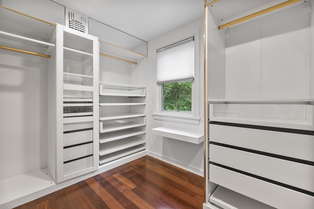 4 Hadley Road Lexington, MA 02420 - Photo 24 of 35 a view of walk in closet with empty racks