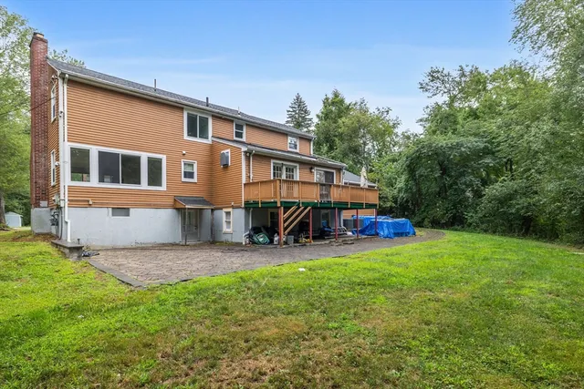 a view of a chairs setting in the balcony