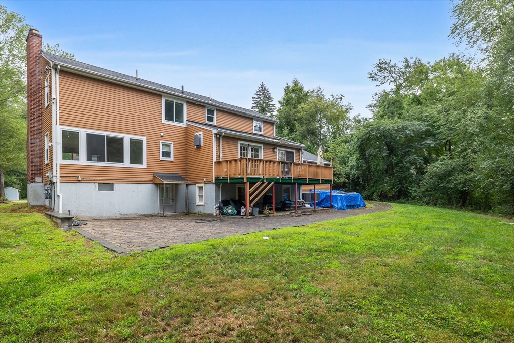 4 Hadley Road Lexington, MA 02420 - Photo 34 of 35 a view of a house with backyard and porch