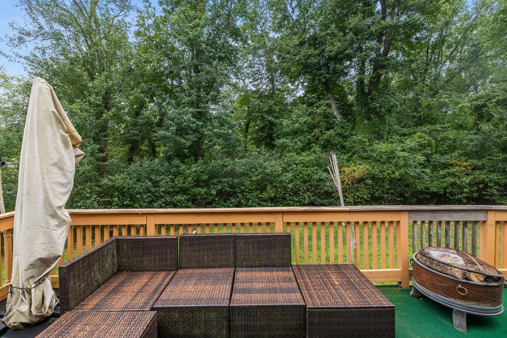 4 Hadley Road Lexington, MA 02420 - Photo 35 of 35 a view of a chairs setting in the balcony