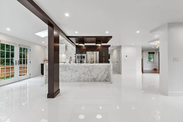 a view of a big room with large windows