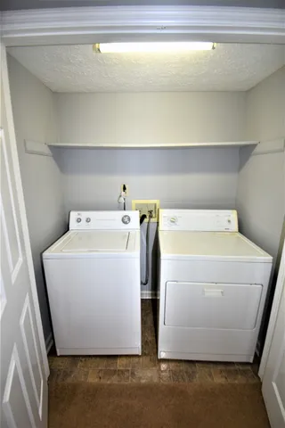 a bathroom with a sink a mirror and shower