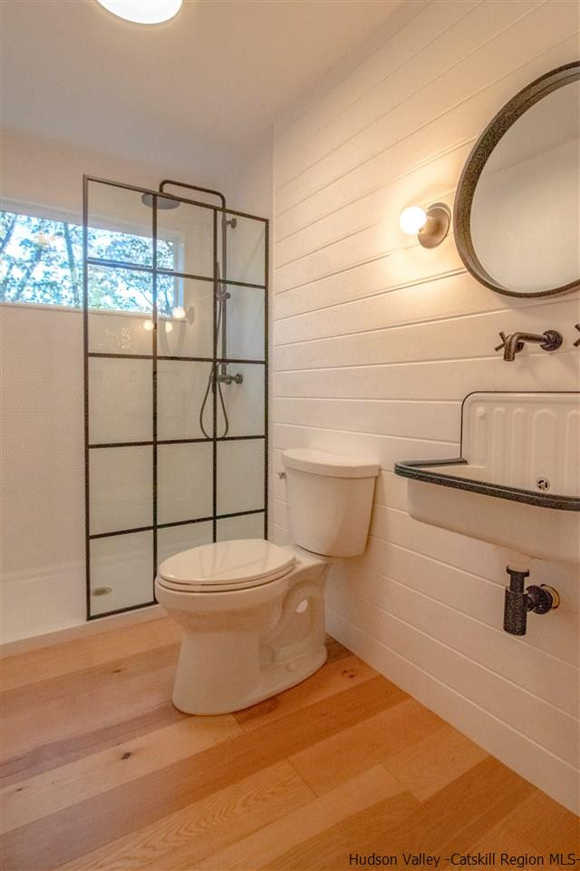 25 Laurel Hollow Road Kerhonkson, NY 12446 - Photo 13 of 30 a bathroom with a sink and a mirror