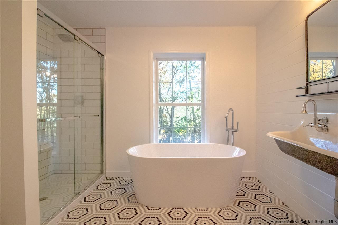 25 Laurel Hollow Road Kerhonkson, NY 12446 - Photo 17 of 30 a bathroom with a sink and a mirror