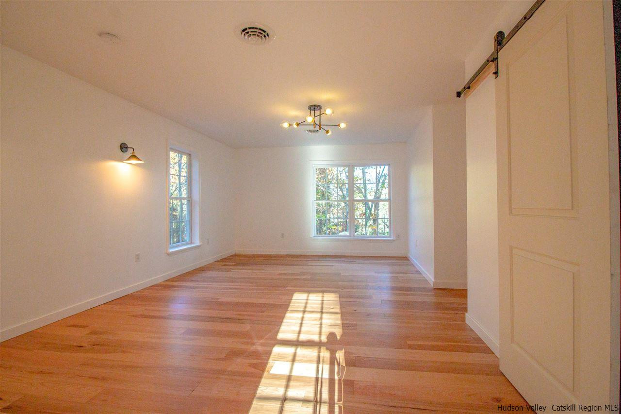 25 Laurel Hollow Road Kerhonkson, NY 12446 - Photo 20 of 30 a view of an empty room and window