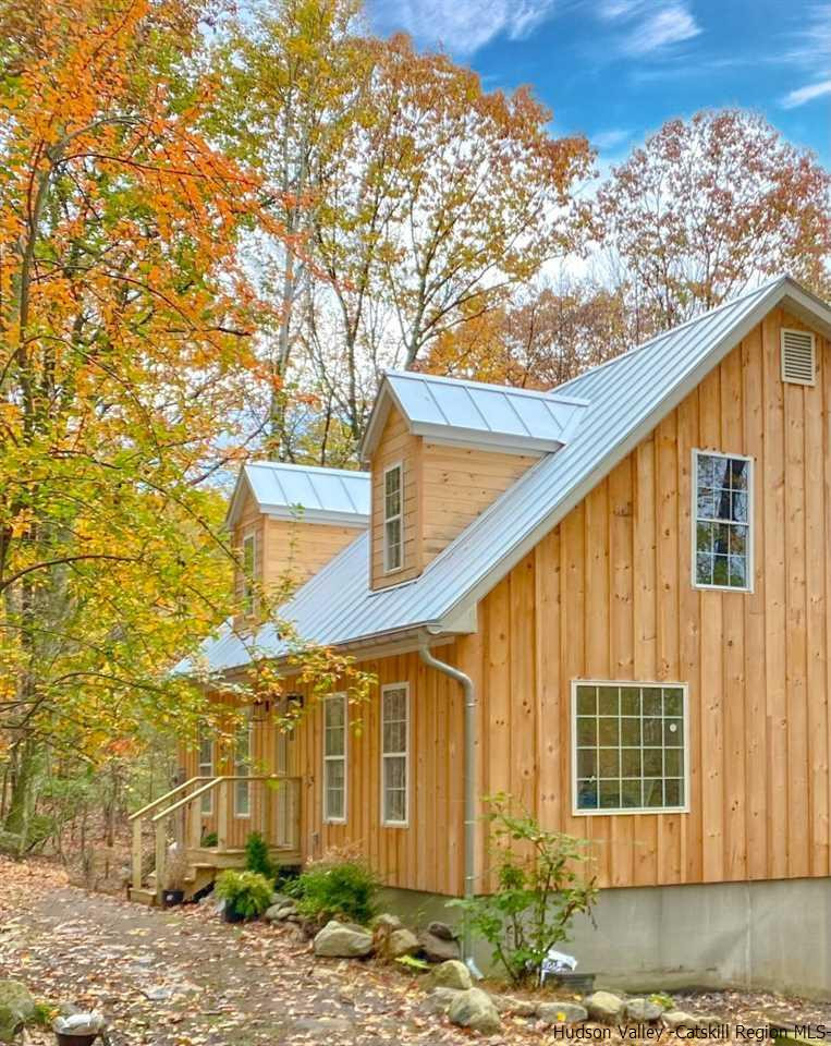 25 Laurel Hollow Road Kerhonkson, NY 12446 - Photo 2 of 30 a view of a brick house with large windows
