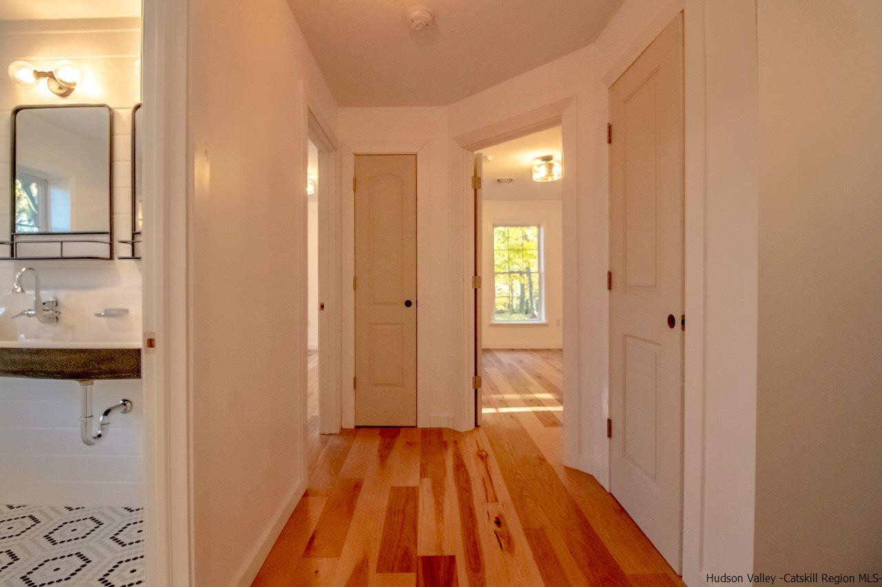25 Laurel Hollow Road Kerhonkson, NY 12446 - Photo 22 of 30 a view of a bathroom from a hallway