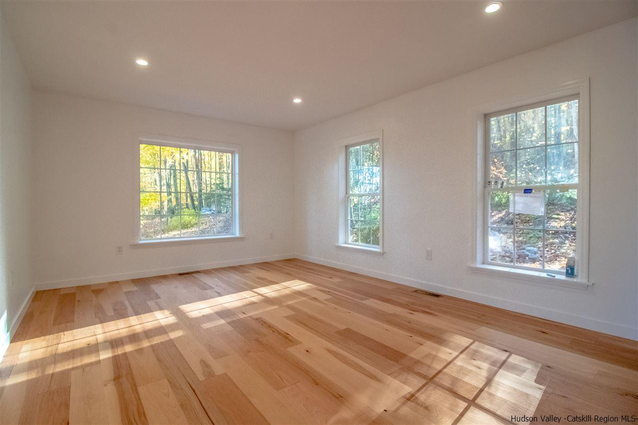 25 Laurel Hollow Road Kerhonkson, NY 12446 - Photo 4 of 30 a view of an empty room and a window