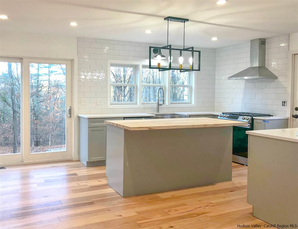 25 Laurel Hollow Road Kerhonkson, NY 12446 - Photo 9 of 30 a view of a kitchen counter space and wooden floor