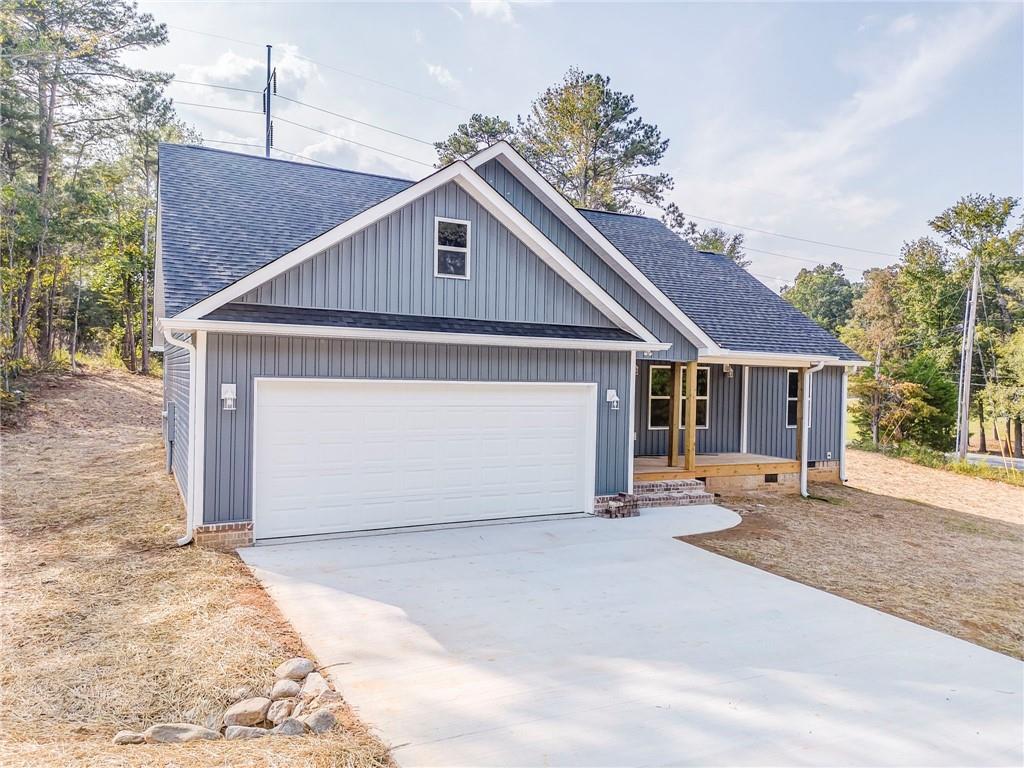 22 Earls Way Chatsworth, GA 30705 - Photo 1 of 64 a view of a house with a patio