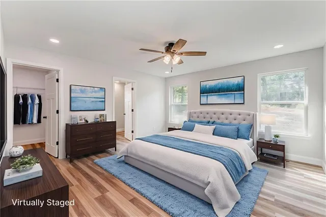a bathroom with double vanity sinks and a mirror