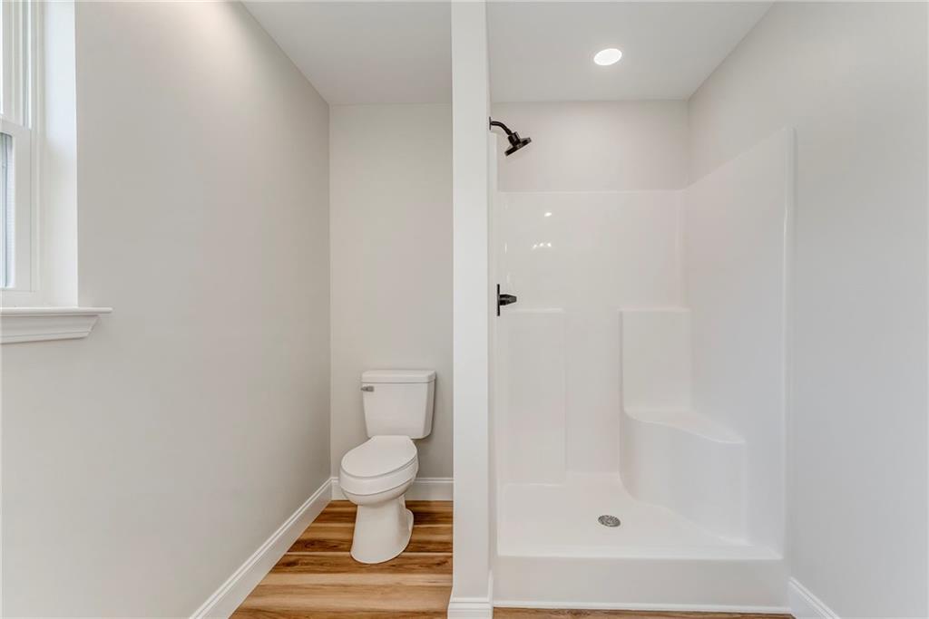 22 Earls Way Chatsworth, GA 30705 - Photo 18 of 64 a bathroom with a toilet and a shower