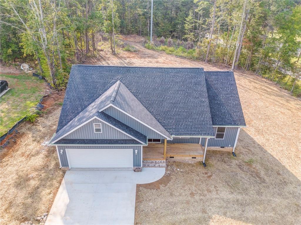 22 Earls Way Chatsworth, GA 30705 - Photo 3 of 64 a backyard of a house with table and chairs