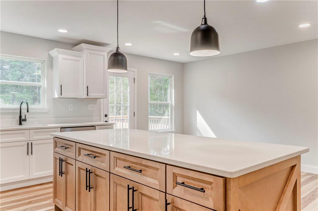 22 Earls Way Chatsworth, GA 30705 - Photo 43 of 64 a kitchen that has a sink a window and cabinets