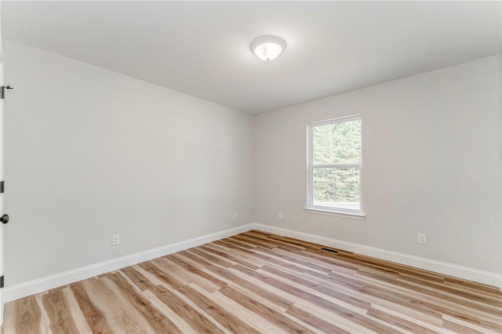22 Earls Way Chatsworth, GA 30705 - Photo 48 of 64 an empty room with a window
