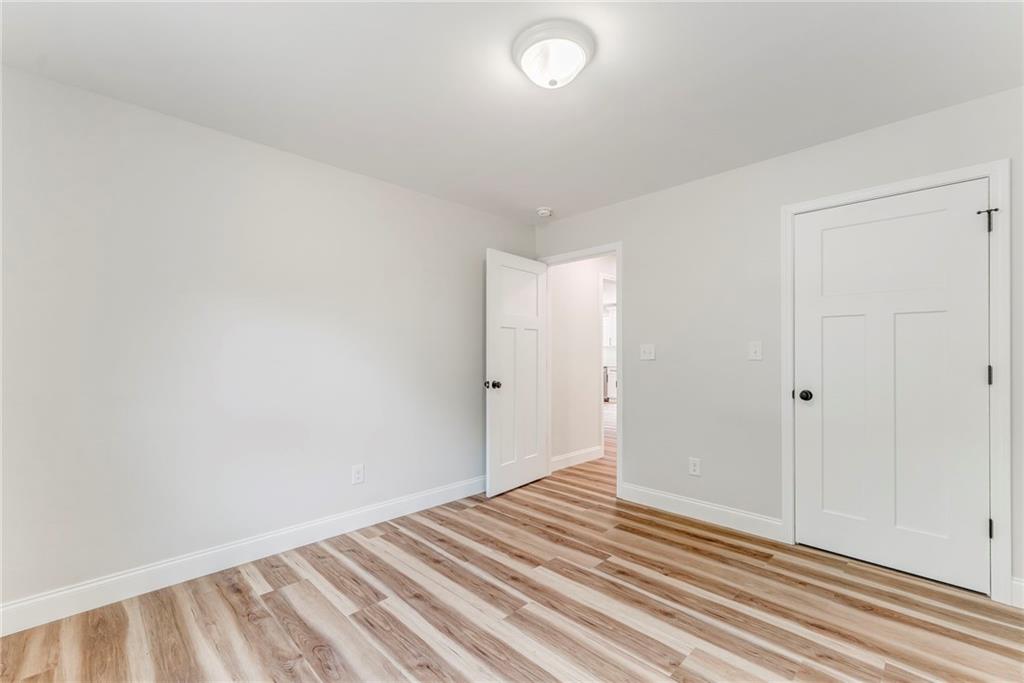 22 Earls Way Chatsworth, GA 30705 - Photo 51 of 64 a view of a room with wooden floor and white wall