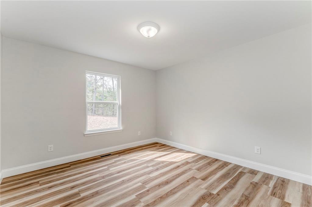 22 Earls Way Chatsworth, GA 30705 - Photo 52 of 64 an empty room with a window