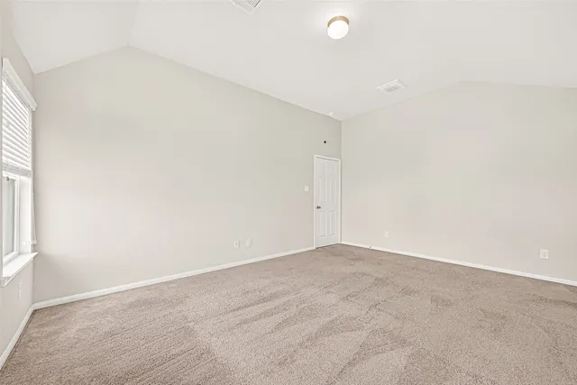 an empty room with a natural light