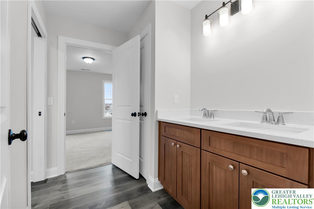 6 West 1st Street Northampton, PA 18067 - Photo 29 of 45 a bathroom with a sink and a mirror