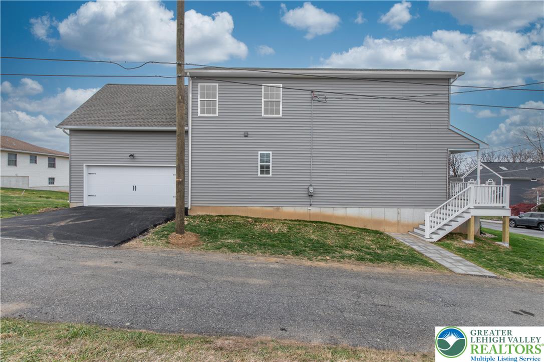 6 West 1st Street Northampton, PA 18067 - Photo 5 of 45 a front view of a house with a yard