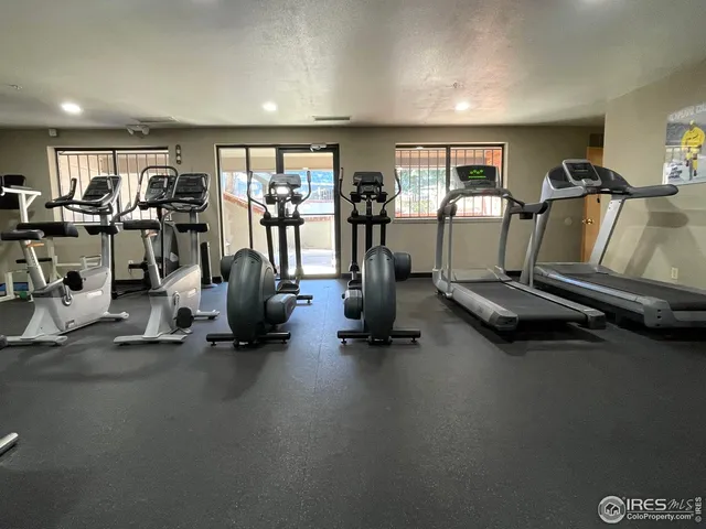 a bathroom with a sink toilet vanity and mirror
