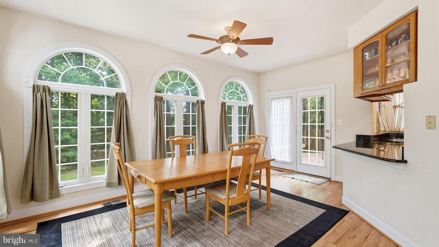 13301 Dumfries Road Manassas, VA 20112 - Photo 15 of 49 Bright dining space with elegant arches.