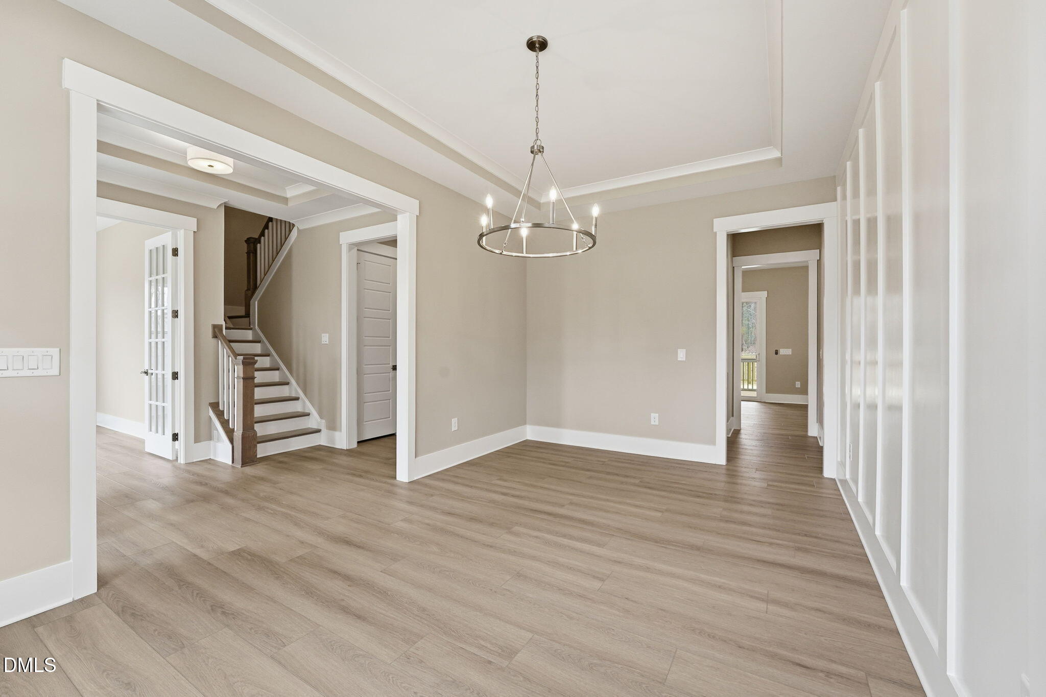 318 Ivy Rdg Road Chapel Hill, NC 27516 - Photo 11 of 47 a view of a hallway with wooden floor and staircase