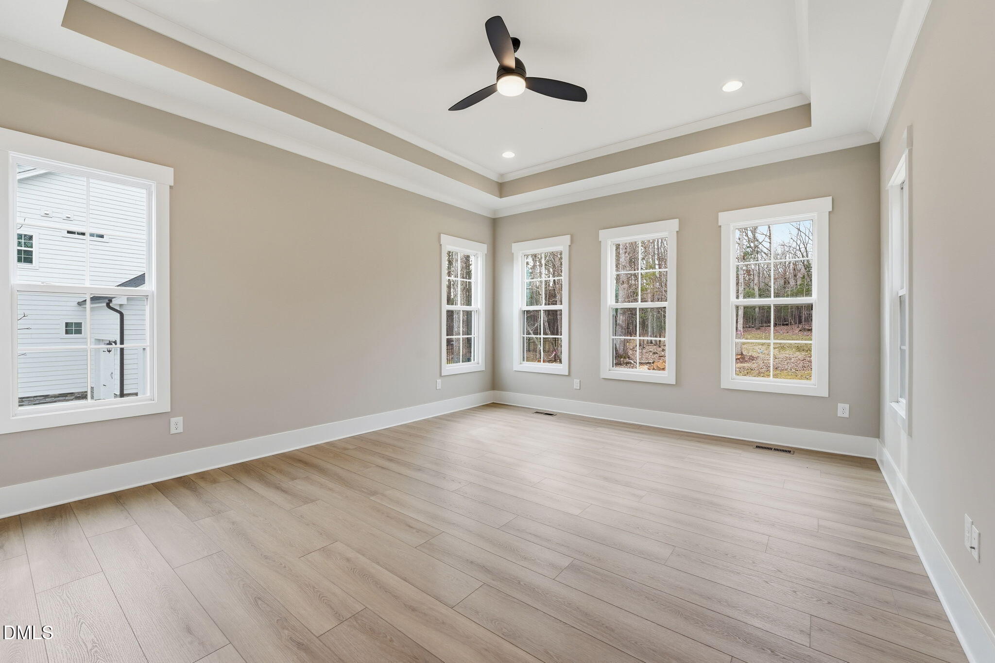318 Ivy Rdg Road Chapel Hill, NC 27516 - Photo 16 of 47 a view of an empty room with wooden floor and a window