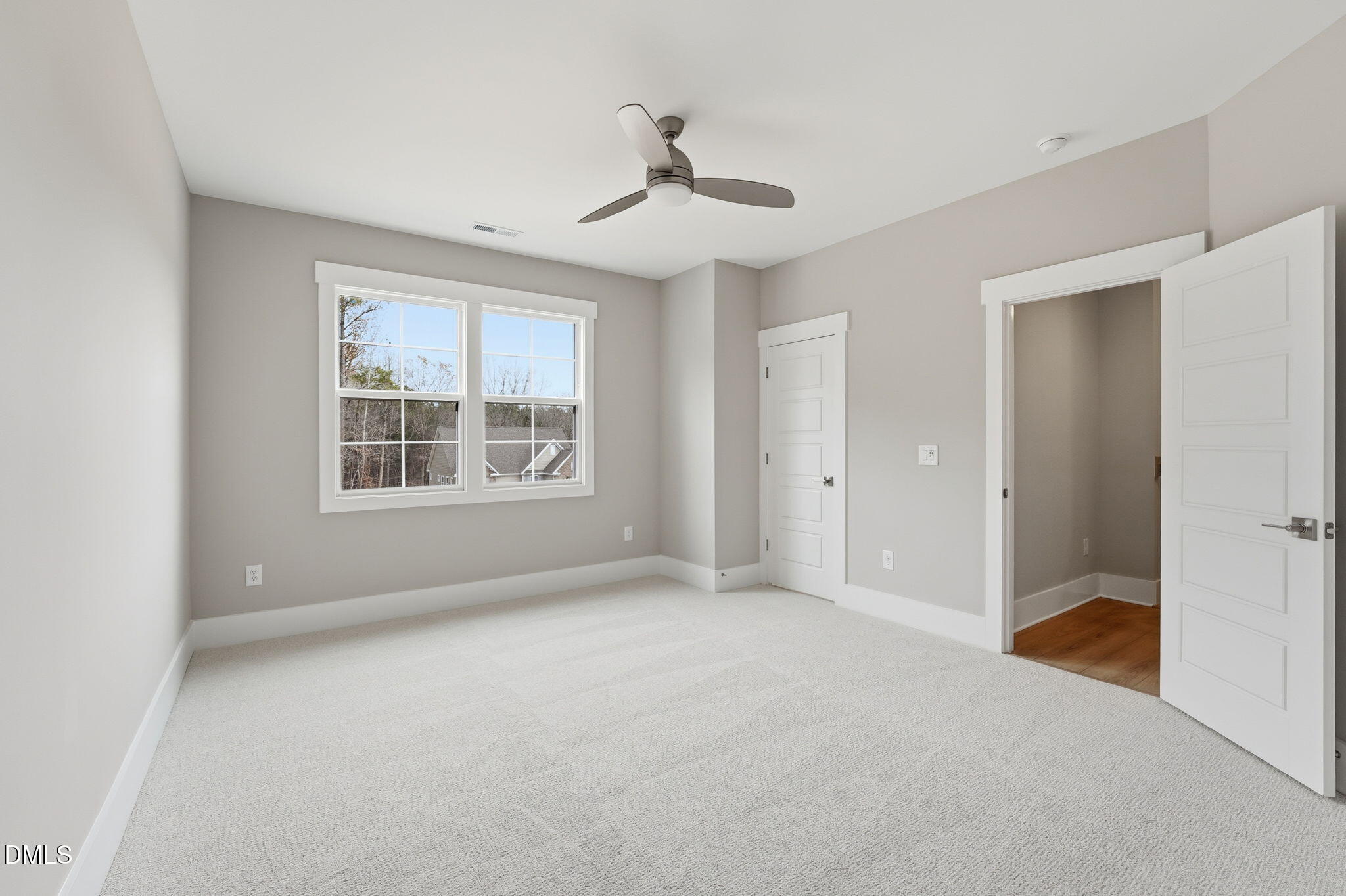 318 Ivy Rdg Road Chapel Hill, NC 27516 - Photo 19 of 47 a view of an empty room with a window