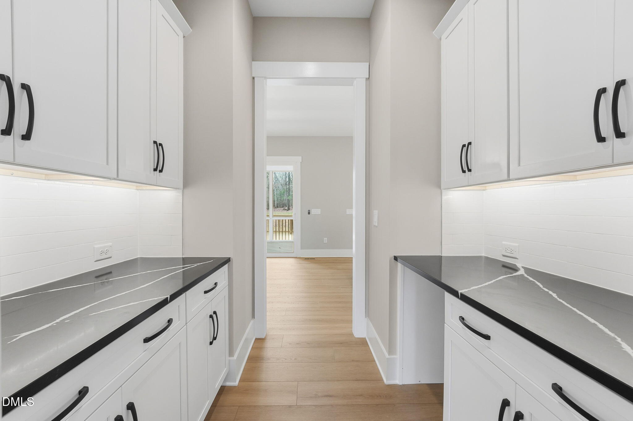 318 Ivy Rdg Road Chapel Hill, NC 27516 - Photo 28 of 47 a kitchen with a sink and cabinets