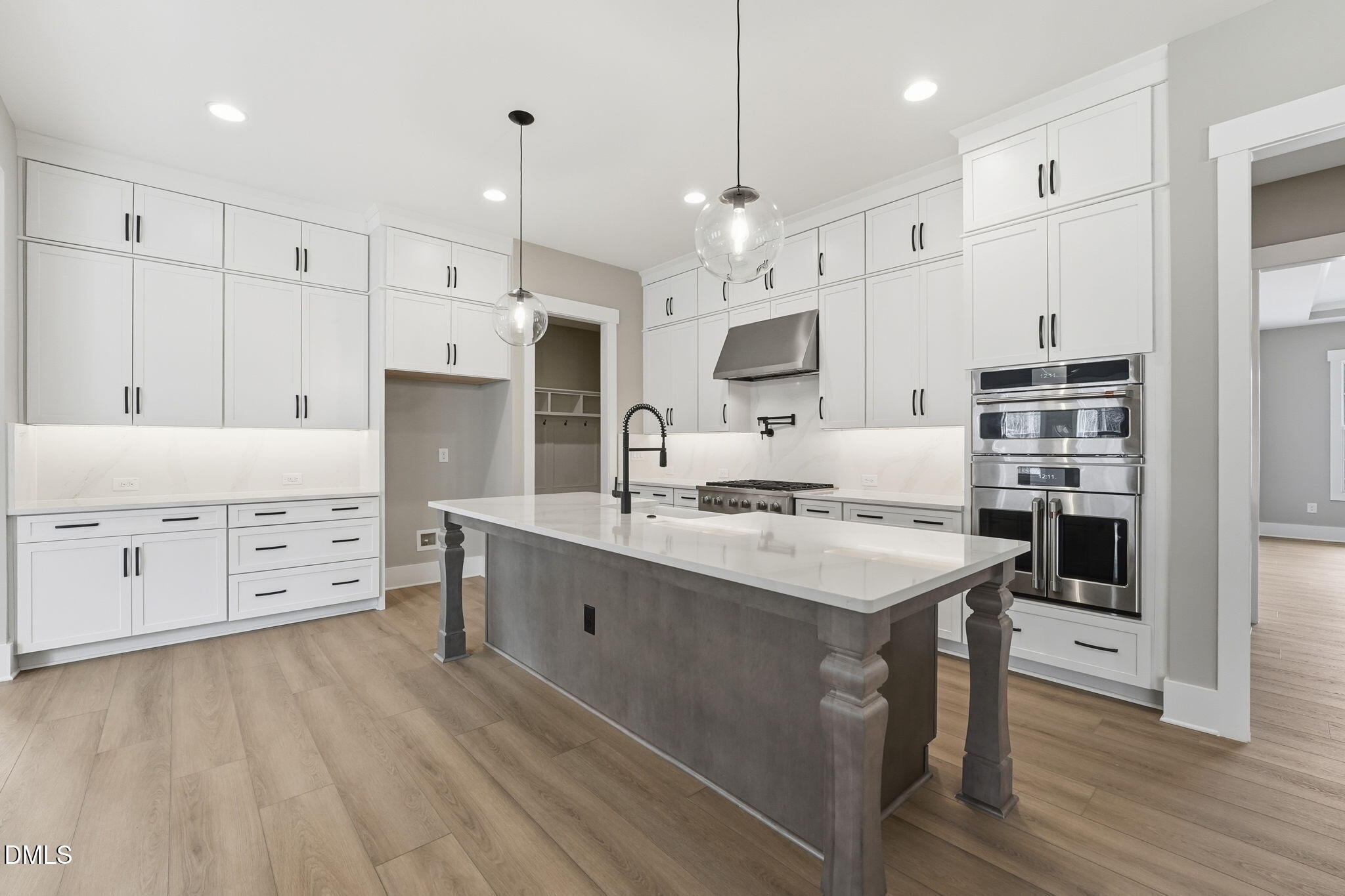 318 Ivy Rdg Road Chapel Hill, NC 27516 - Photo 4 of 47 a kitchen with stainless steel appliances a stove refrigerator sink and microwave