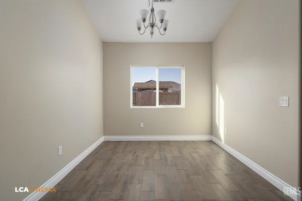 an empty room that has a window